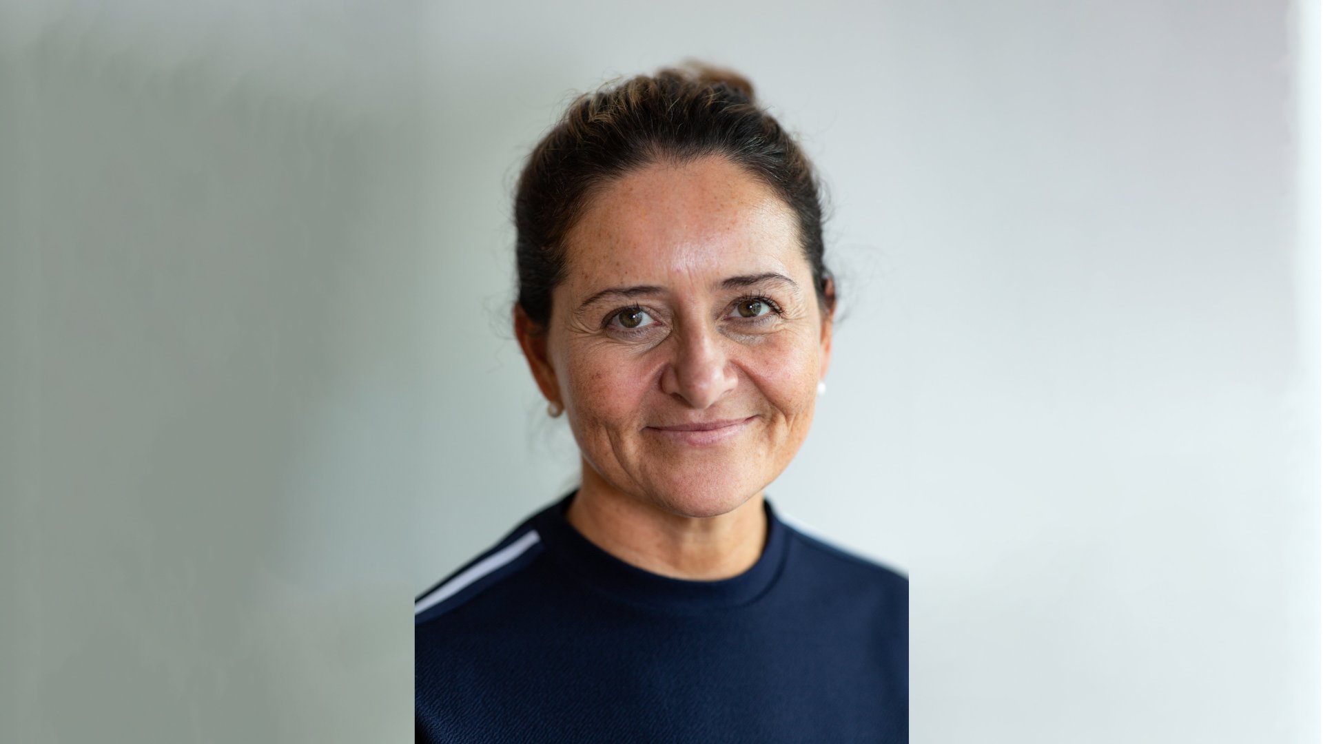 Christine J. Tellnes smiler mot kamera