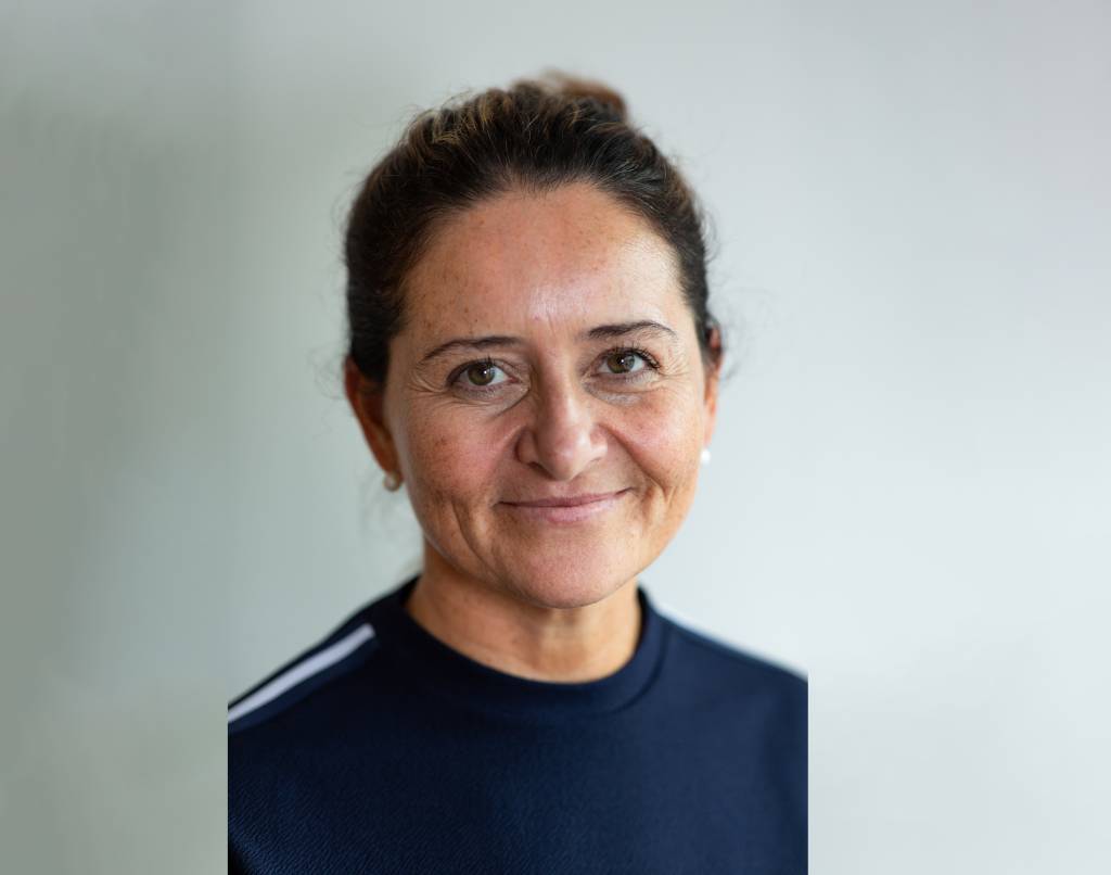 Christine J. Tellnes smiler mot kamera